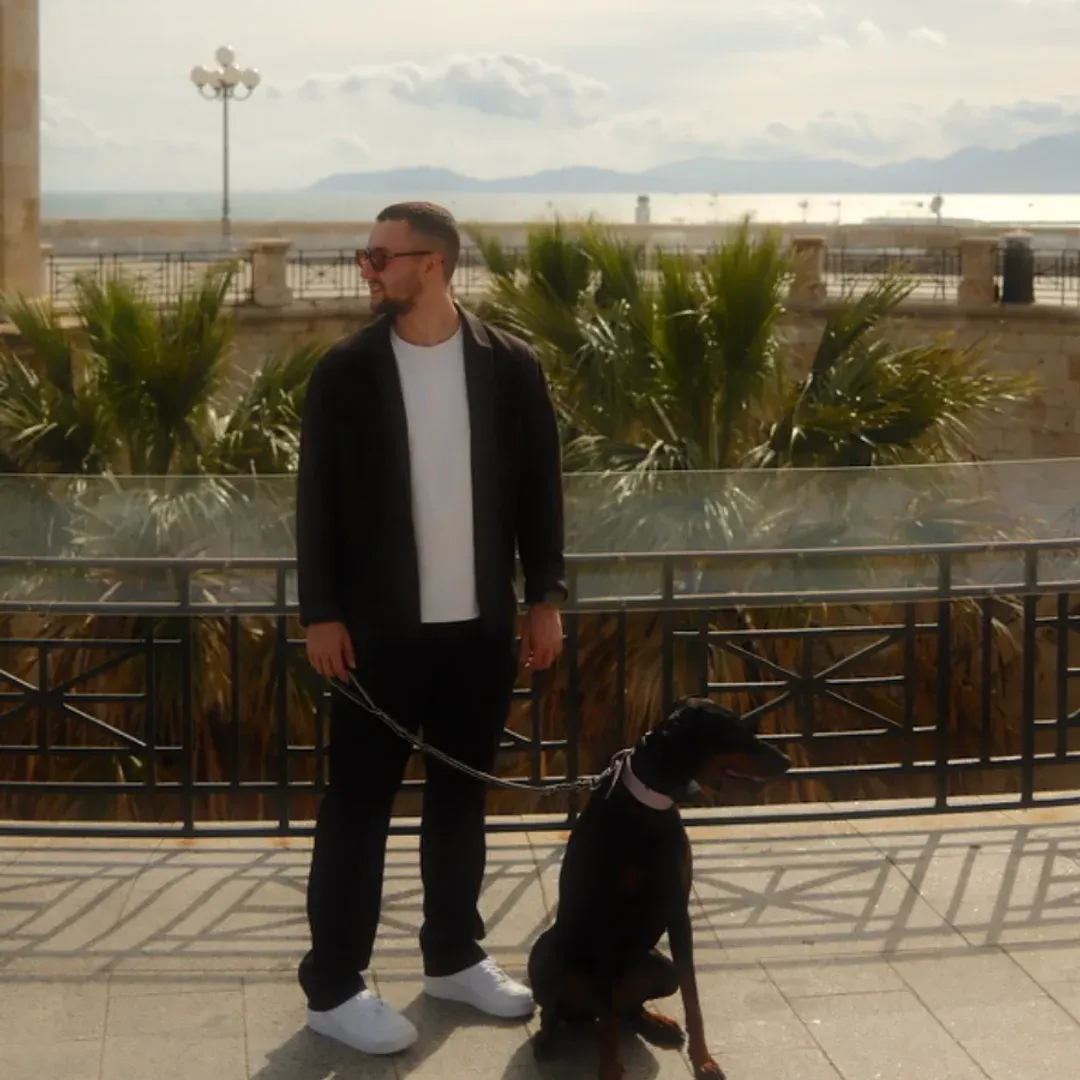 Bohuslav with his dog on a seaside terrace