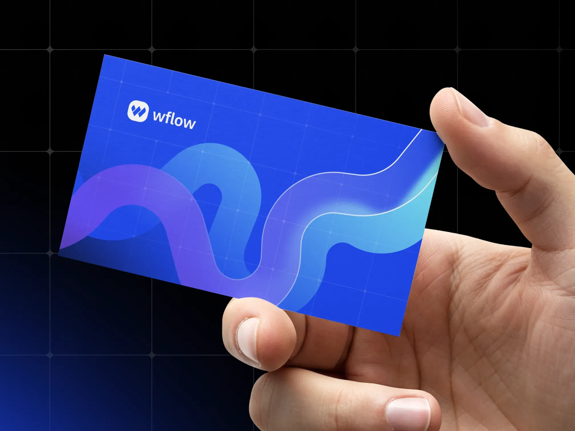 wflow business card held in a hand